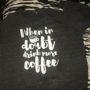 A dark grey long sleeve shirt.